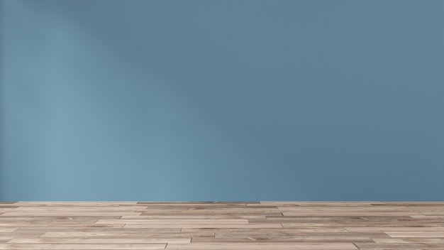 Mur bleu foncé dans une pièce vide avec un plancher en bois.