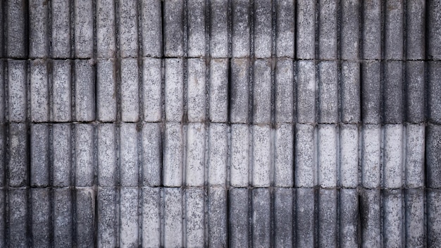 mur de blocs à motif de béton vintage arrière-plan de l'idée de conception rustique