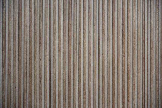 Mur en bois de fond avec de fines lignes verticales