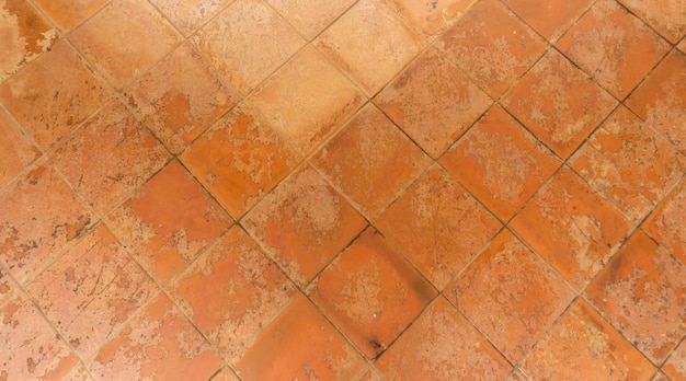 Mur en brique de diamant carrée de couleur brune naturelle sur le fond