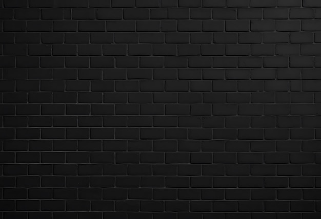 un mur de brique noire avec un fond sombre