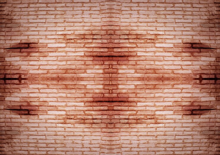 Photo un mur de brique rouge