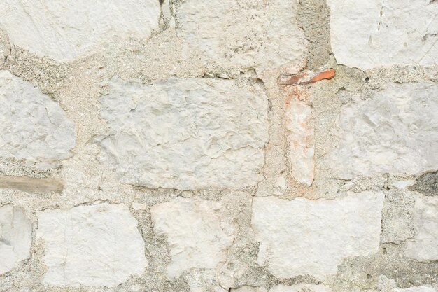 Mur de briques anciennes de texture de briques anciennes légères