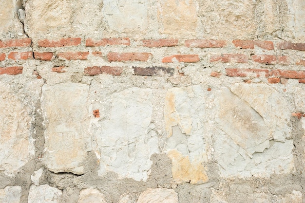 Mur de briques anciennes de texture de briques anciennes légères