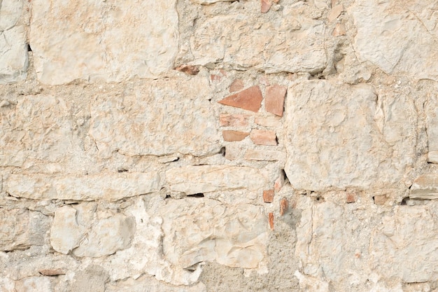 Mur de briques anciennes de texture de briques anciennes légères