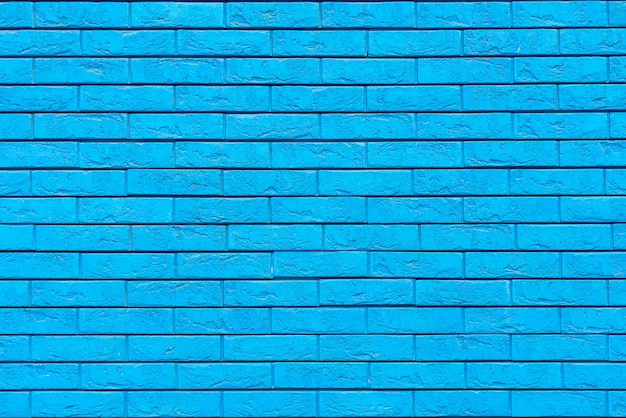 Mur de briques bleues. Design intérieur loft. Peinture bleue de façade.