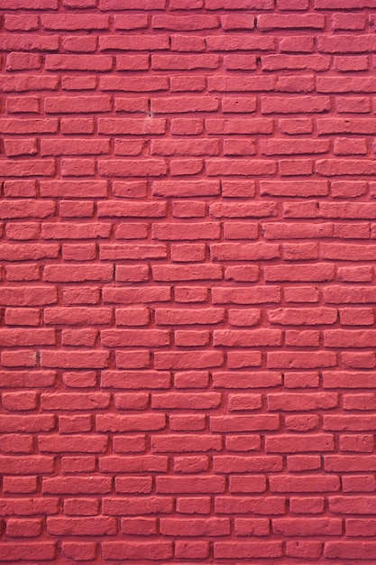 Mur de briques colorées rouge framboise