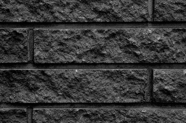 mur de briques graphite noir. fond de magazine
