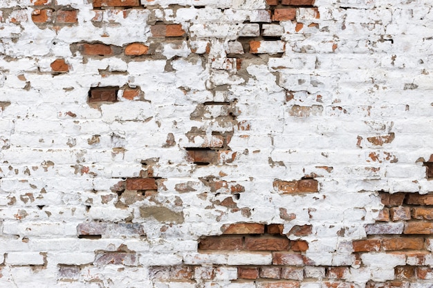 Mur de briques grunge rouge et blanc