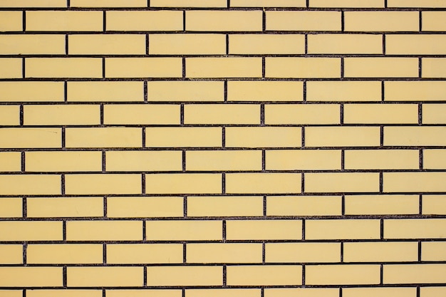 Mur de briques jaunes