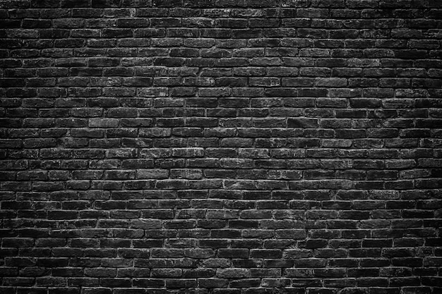Mur de briques noires avec fond effet rétro pour la conception