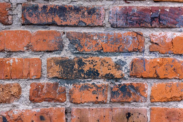 Mur de briques rouges de texture du garage