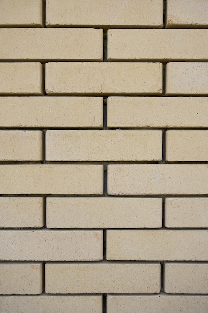 mur de briques se bouchent. mur de briques légères. la photo peut être utilisée comme fond de photo