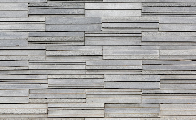 Mur de briques de texture de pierre grise moderne