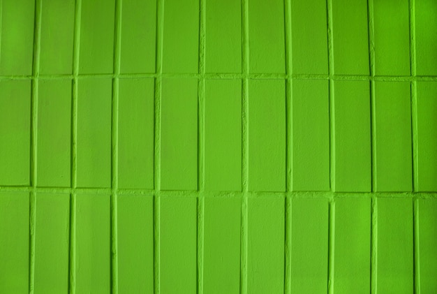 mur de briques vertes comme toile de fond