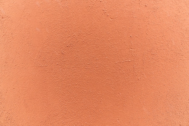 Mur brun orange, plâtre. Espace de texture solide