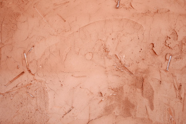 mur de ciment brun, sol en béton sale