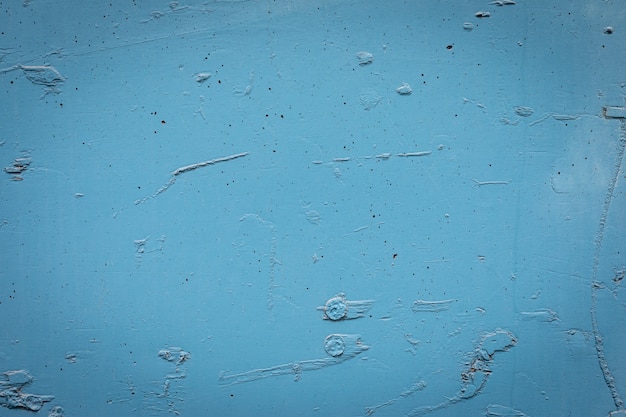 Mur fissuré peint en bleu - fond - motif.