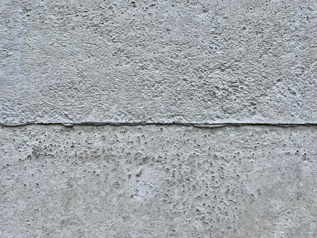 Un mur gris avec une ligne qui dit 'le mot' dessus '