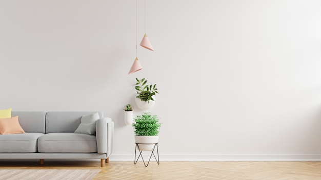 Mur intérieur de salon avec canapé gris et plante, rendu 3D