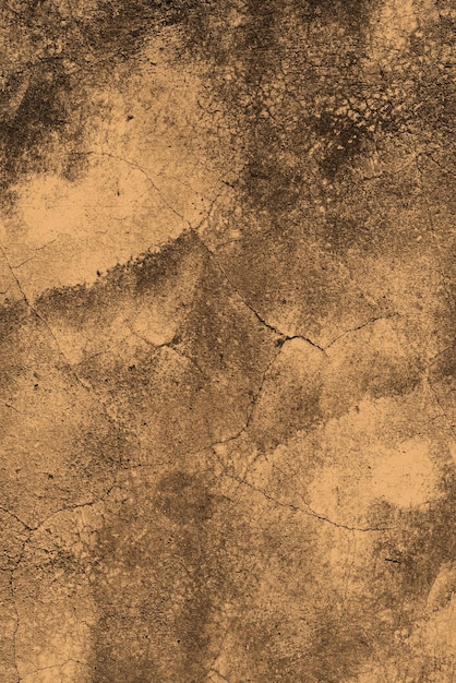 Mur de plâtre de ciment brun foncé avec texture fissure et grunge