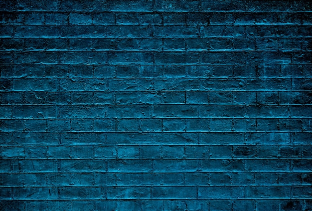 Mur de texture de brique sombre.