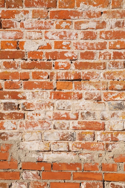 Mur de vieilles briques rouges. Peut être utilisé comme arrière-plan ou texture.