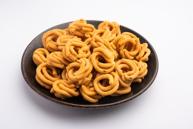 Photo murukku également connu sous le nom de snack végétarien traditionnel indien du sud chakli