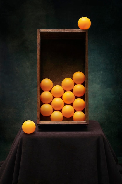 Nature morte à la boîte à boules oranges