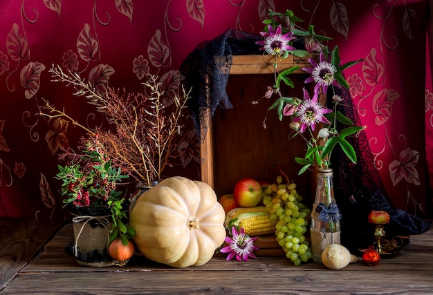 Nature morte à la citrouille sur fond de bois