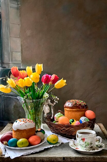 Photo la nature morte des fleurs et des œufs de pâques