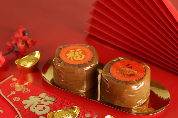 Nian gao ou Kue bakul ou keranjang Chinese New Year Cake (avec le caractère chinois Fu signifie Fortune).