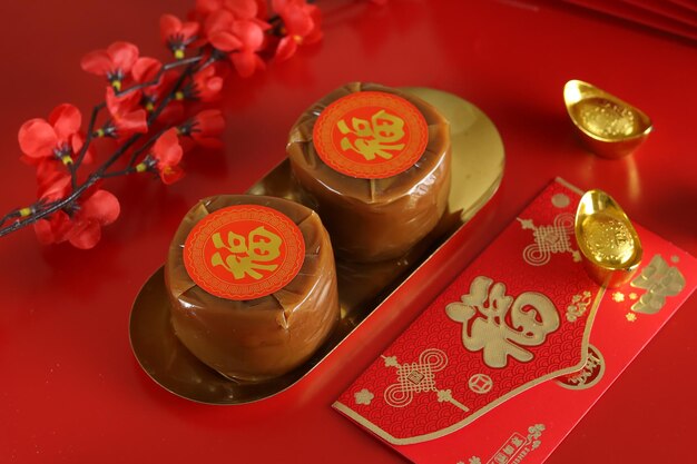Nian gao ou Kue bakul ou keranjang Chinese New Year Cake (avec le caractère chinois Fu signifie Fortune).