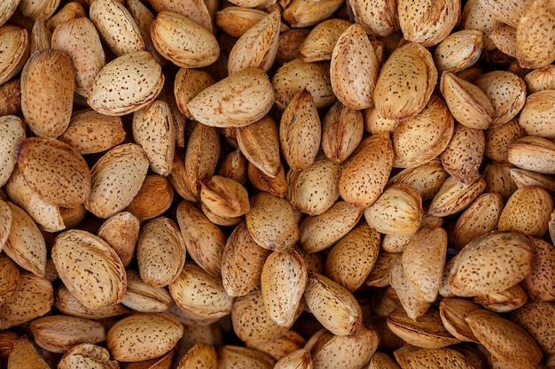 Les noix aux amandes peuvent être utilisées comme arrière-plan.