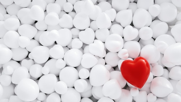 De nombreux coeurs blancs sur une pile avec un seul coeur rouge en arrière-plan. idéal pour les mises en page de sites Web et de magazines