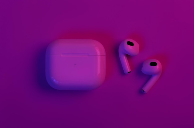 Nouveaux Apple AirPods 3 sans fil sur fond néon