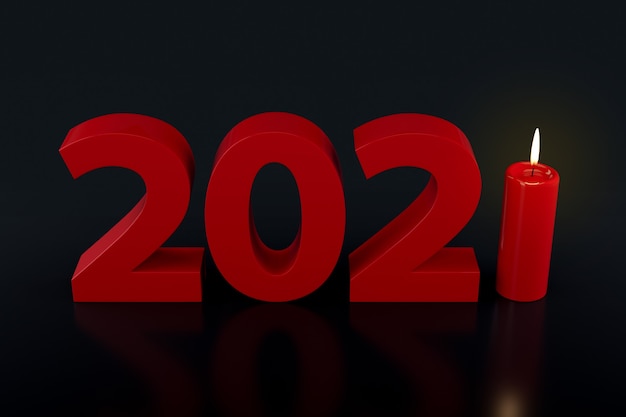 Nouvel an 2021 écrit avec une bougie éclairant l'année, isolé sur fond noir.