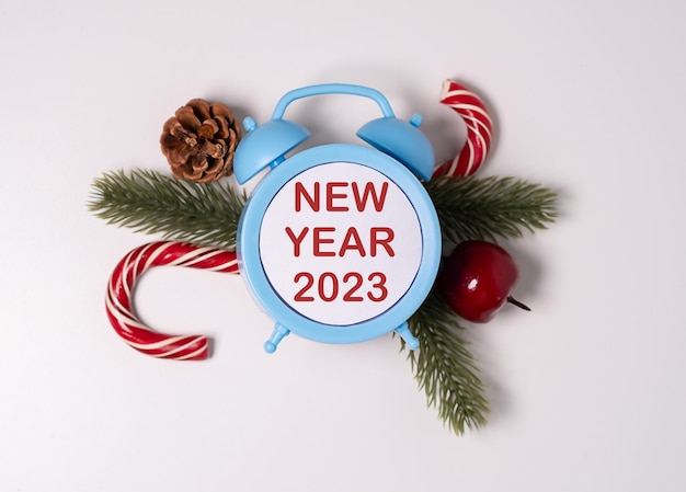 Nouvel an 2023 fond vacances du nouvel an l'inscription sur l'horloge décor de Noël