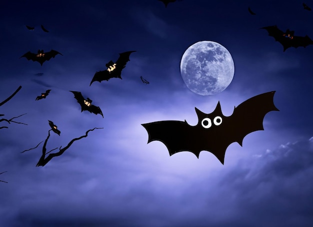 La nuit d'Halloween, la lune effrayante dans le ciel nuageux avec des chauves-souris