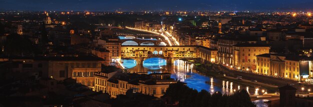 Photo la nuit sur le ponte vecchio