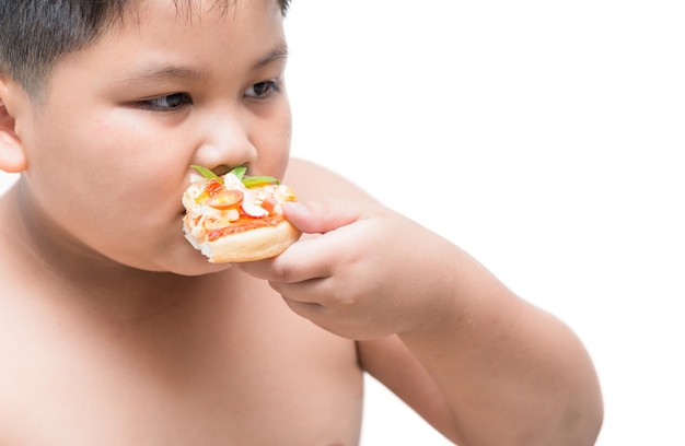 obèse gros garçon, manger des pizzas de fruits de mer