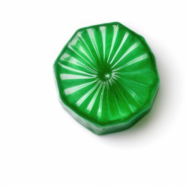 Un objet en verre vert avec un motif vert et blanc.