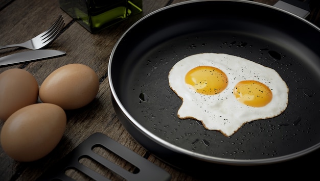 Oeuf avec deux jaunes en forme de crâne