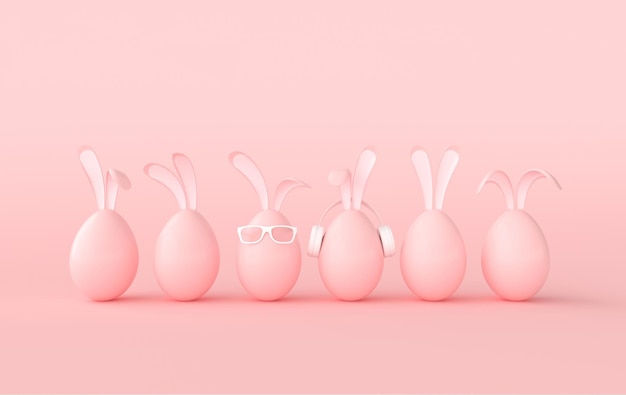 Oeuf de Pâques avec des lunettes d'oreilles de lapin sur fond rose Joyeuses Pâques grande chasse