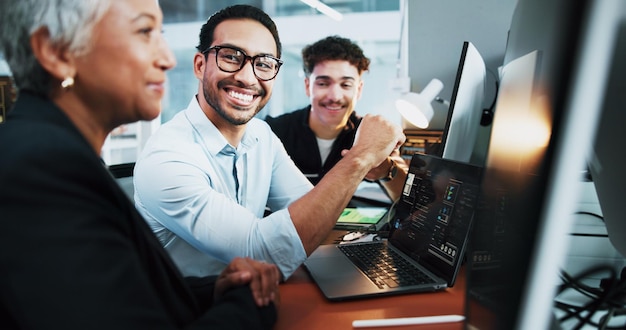 Office teamwork and business people with laptop for coding programming and conversation at night Coworking employees and programmers with tech for software update web development and deadline