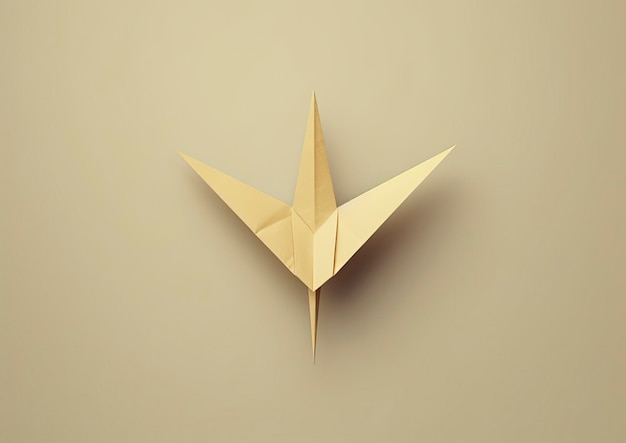 Photo un oiseau origami sur un fond beige