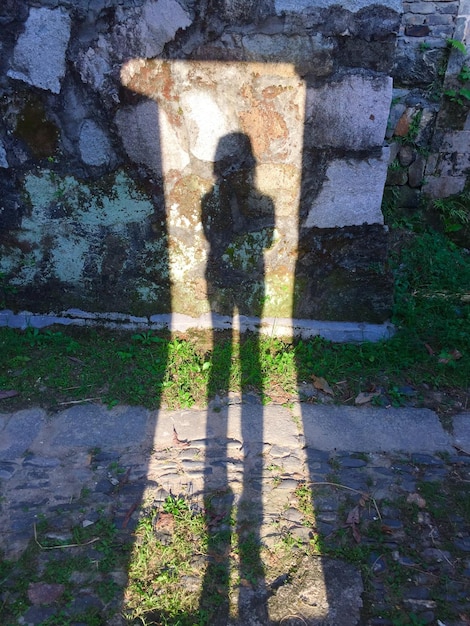 Photo l'ombre d'une femme sur le mur