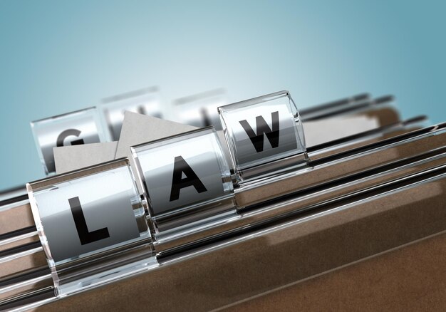 Onglets de dossier avec des lettres composant le mot loi, image conceptuelle pour l'illustration de la justice.