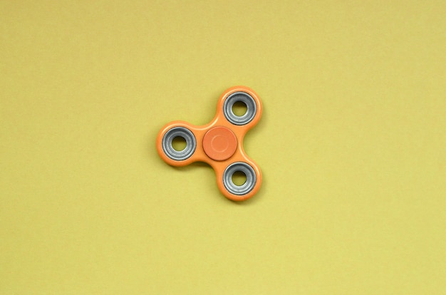 Orange Fidget Spinner Se Trouve Sur La Texture De La Mode Orange Pastel