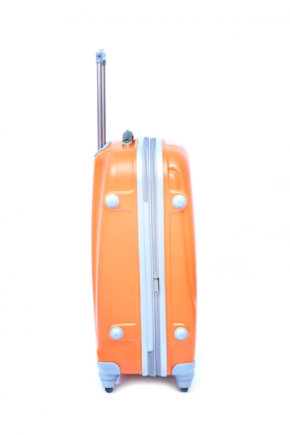 Orange de grande valise moderne sur un blanc